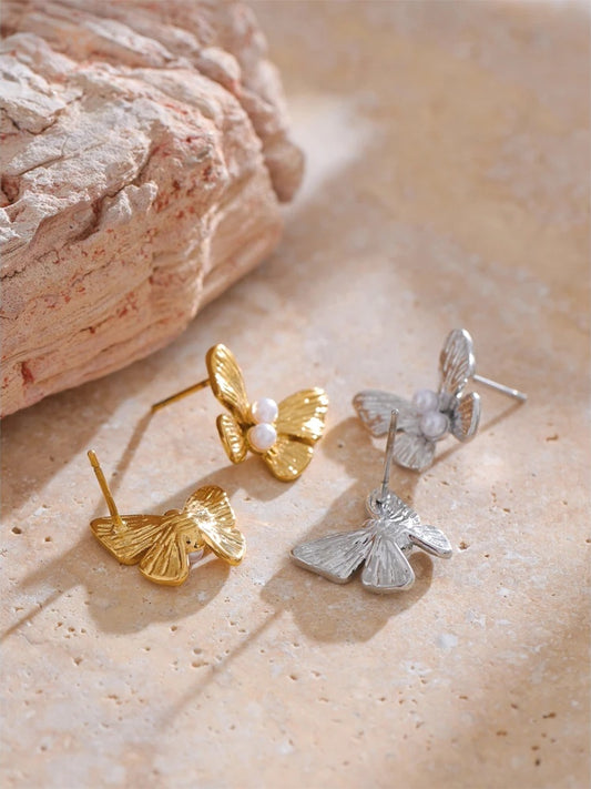Simulated pearl butterfly push-back stud earrings - product image