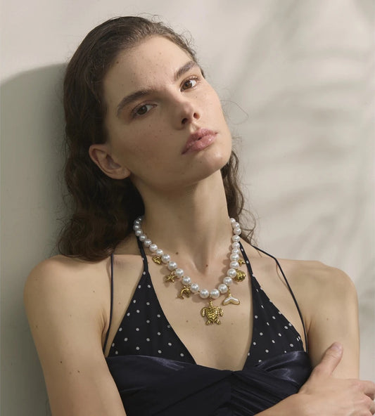 Simulated pearl chain turtle shell pendant - product image