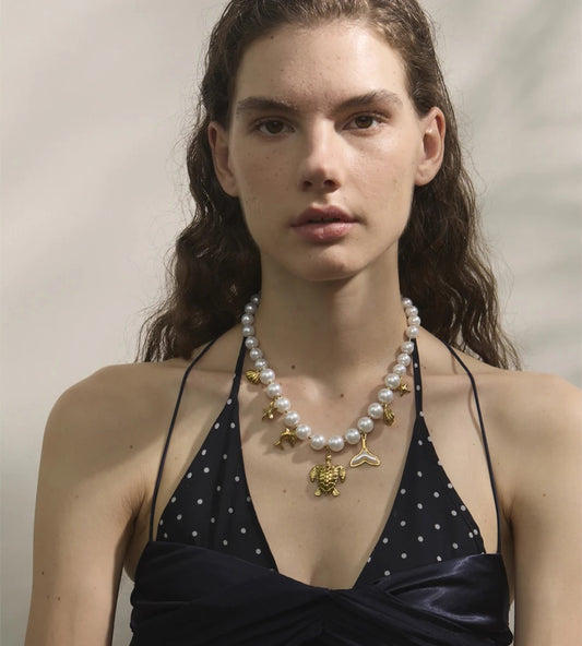 Simulated pearl chain turtle shell pendant - product image