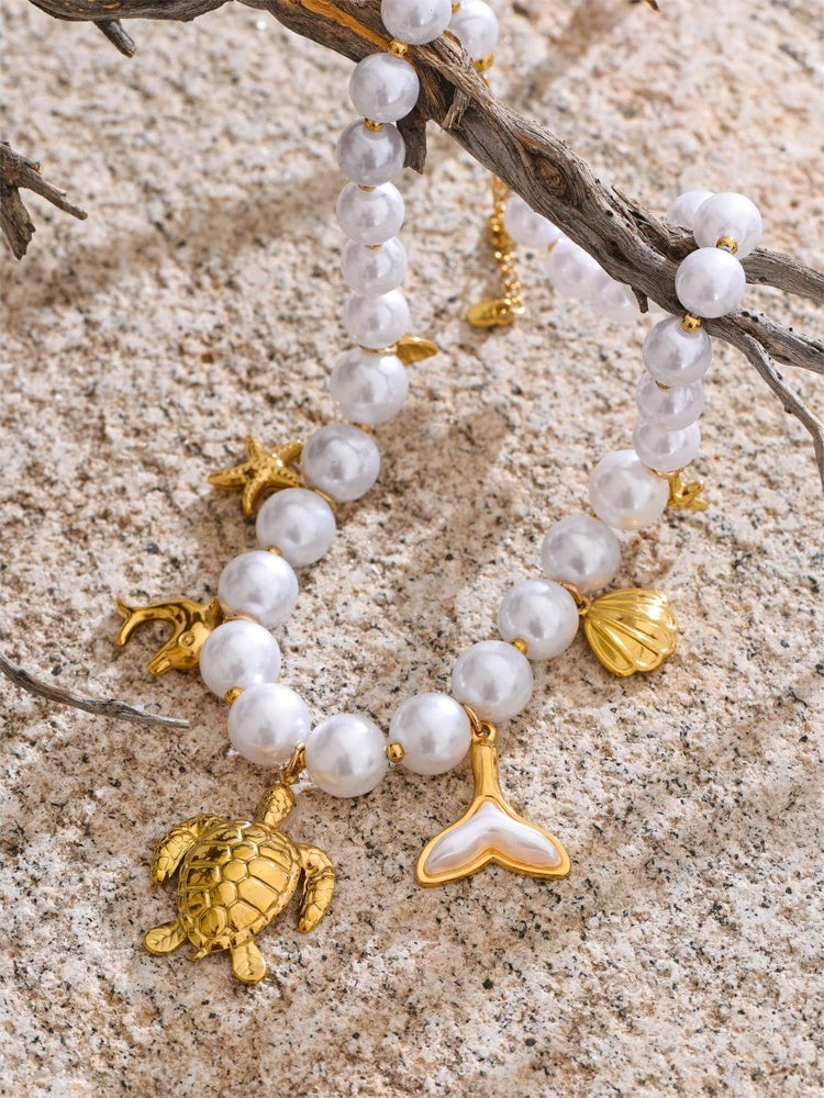 Simulated pearl chain turtle shell pendant - product image