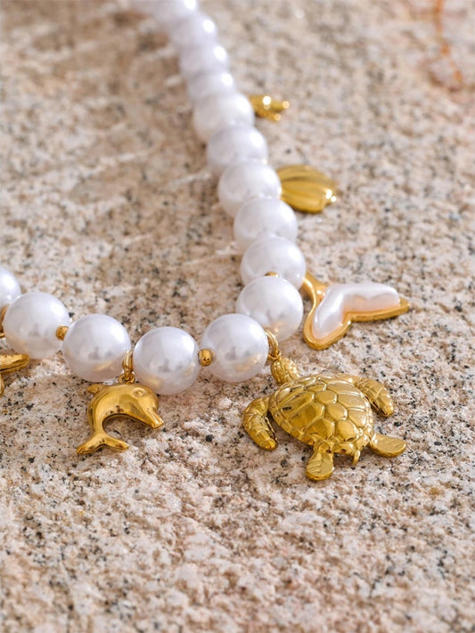 Simulated pearl chain turtle shell pendant - product image