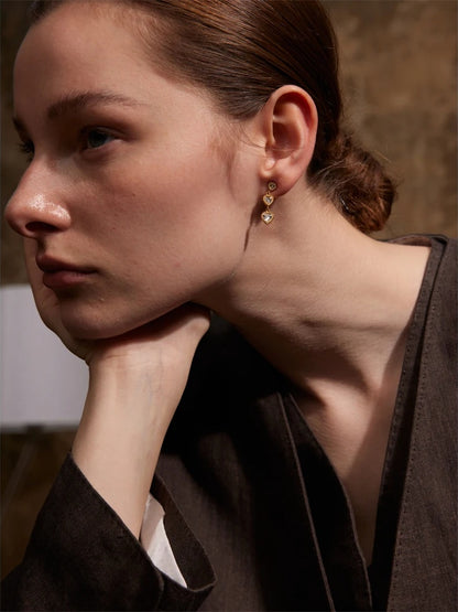 Small shiny cubic zirconia heart drop earrings - product image
