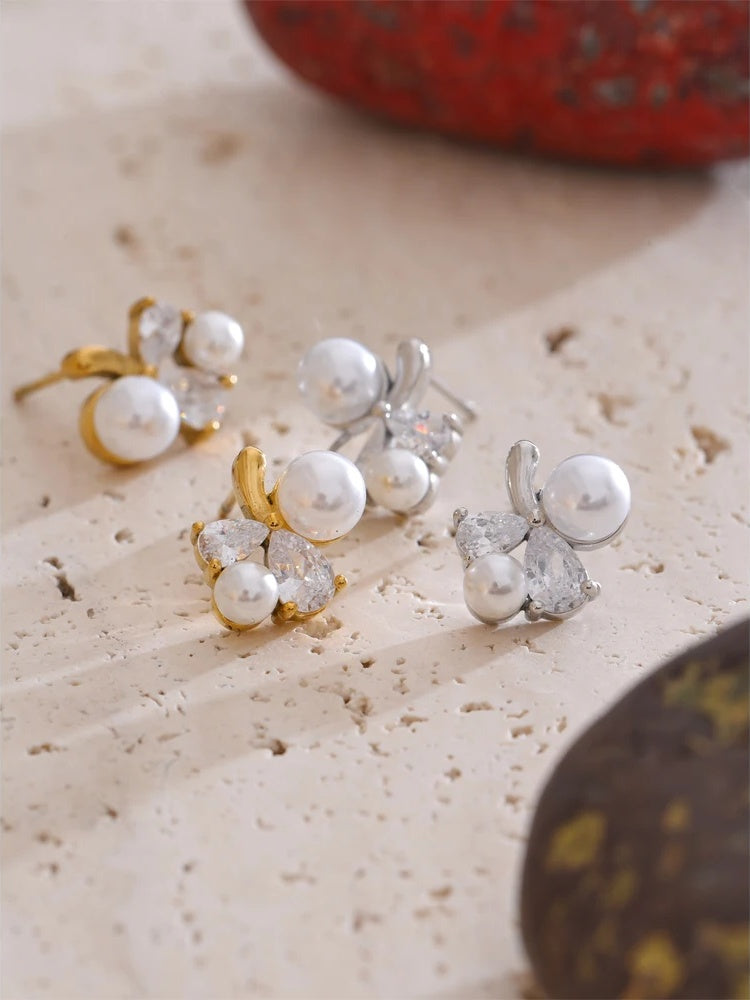 Smooth pearl cubic zirconia flower stud earrings - product image