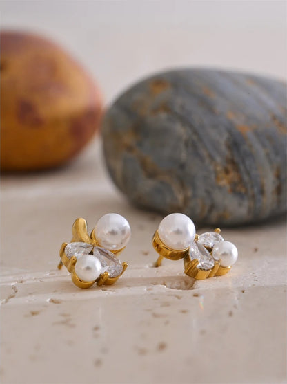 Smooth pearl cubic zirconia flower stud earrings - product image