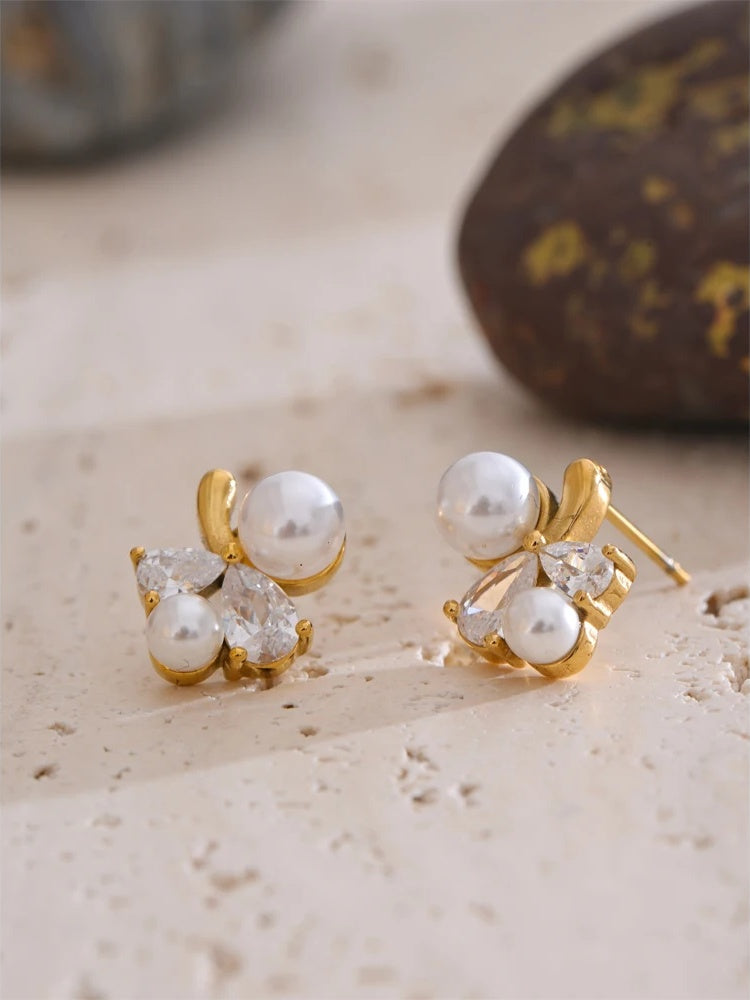 Smooth pearl cubic zirconia flower stud earrings - product image