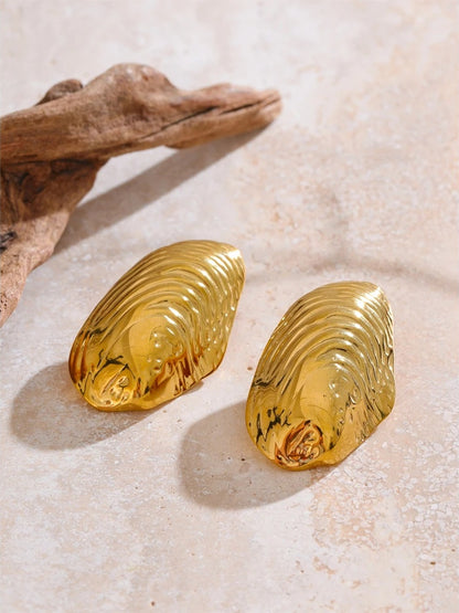 Statement gold color big stud earrings - product image
