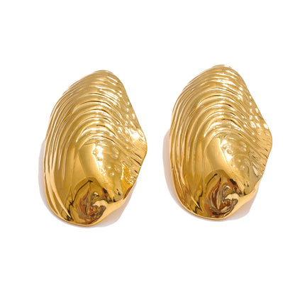 Statement gold color big stud earrings - product image