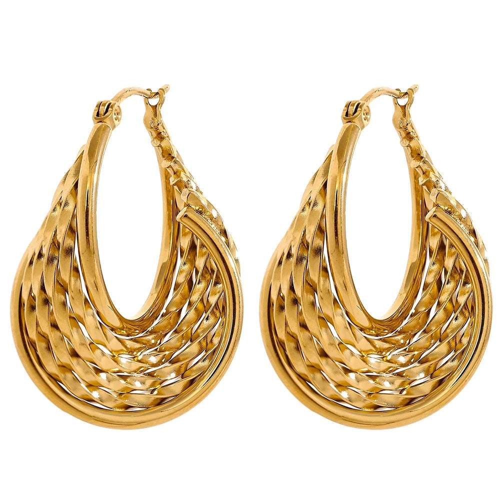 Twisted hollow hoop contemporary statement earrings - product image