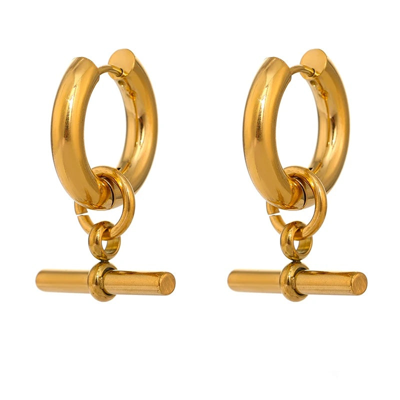 Unusual contemporary statement gold color huggie earrings - product image