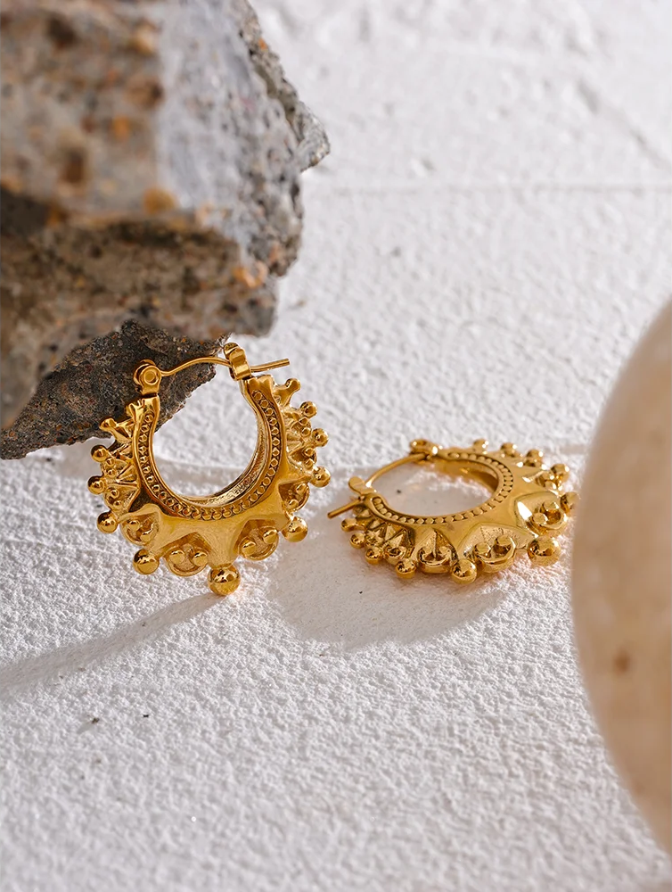 Vintage round half empty hoop earrings - product image