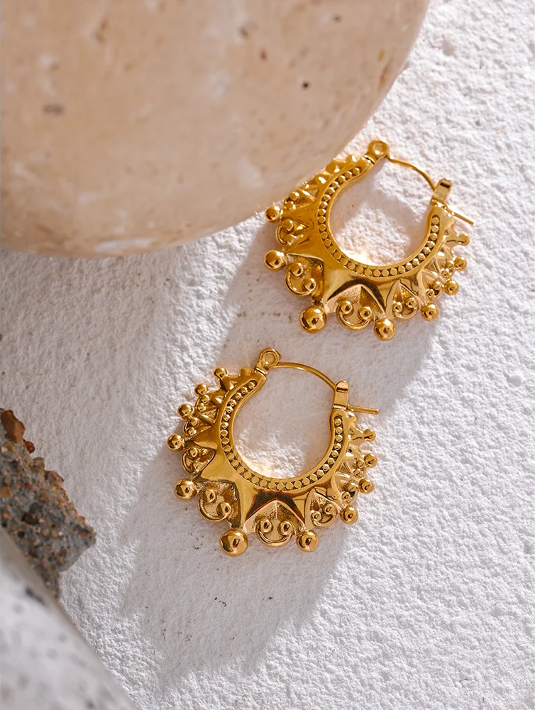 Vintage round half empty hoop earrings - product image