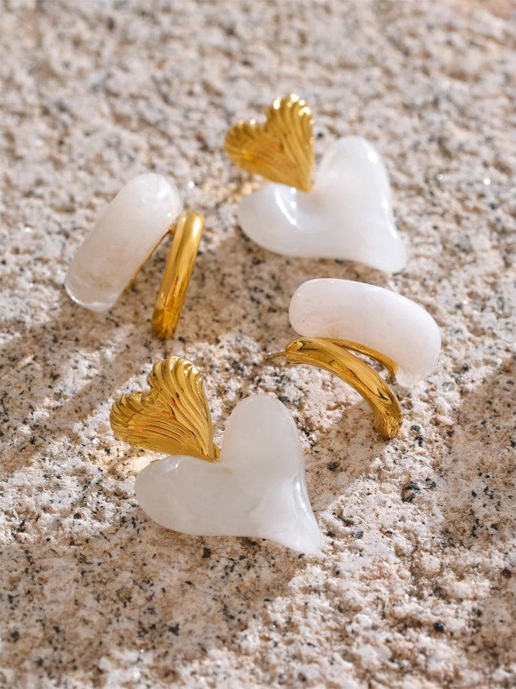 White resin heart c-shape abstract stud earrings - product image