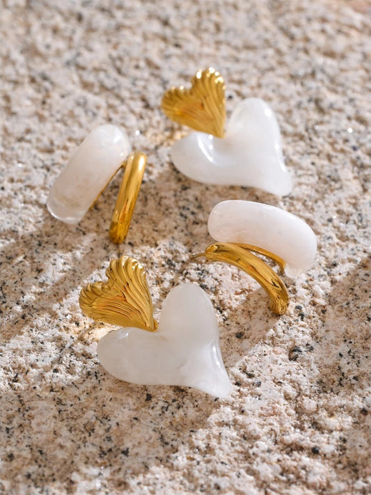 White resin heart c-shape abstract stud earrings - product image