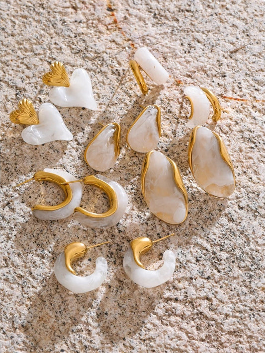 White resin heart c-shape abstract stud earrings - product image