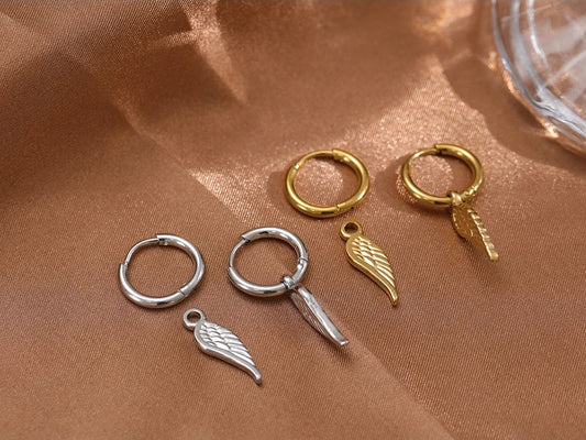 Wing huggie abstract chunky trendy hoop earrings - product image