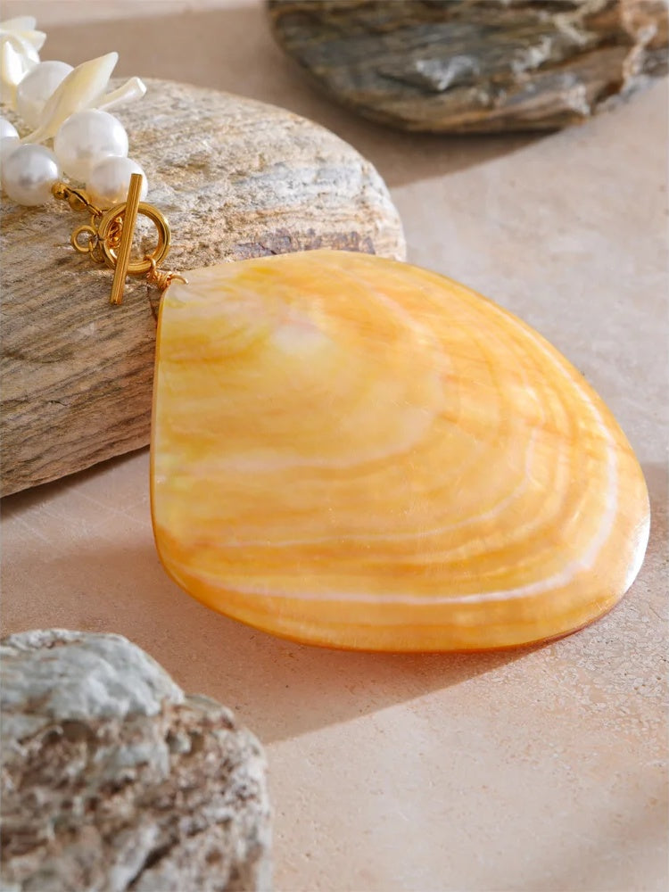 Yellow shell simulated pearl pendant necklace - product image
